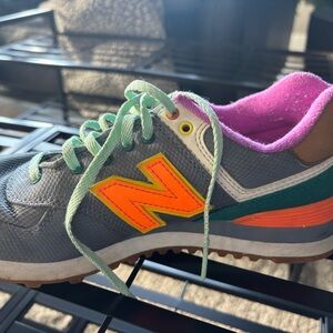 New Balance Sneakers with Orange and Purple Accents
